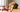 dog uti symptoms dog with cranberries sitting on table looking concerned