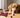 dog uti symptoms dog with cranberries sitting on table looking concerned